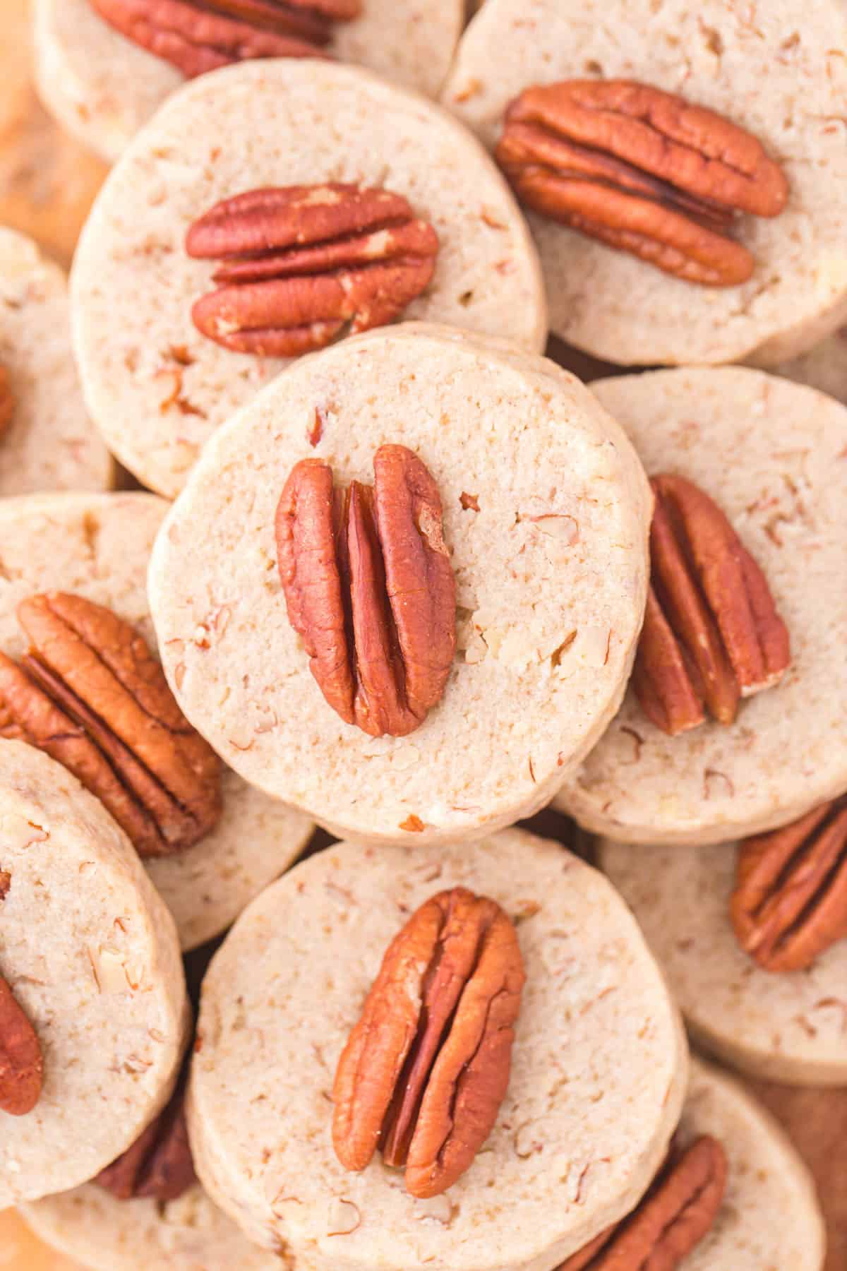 a pile of pecan sandies cookies close up