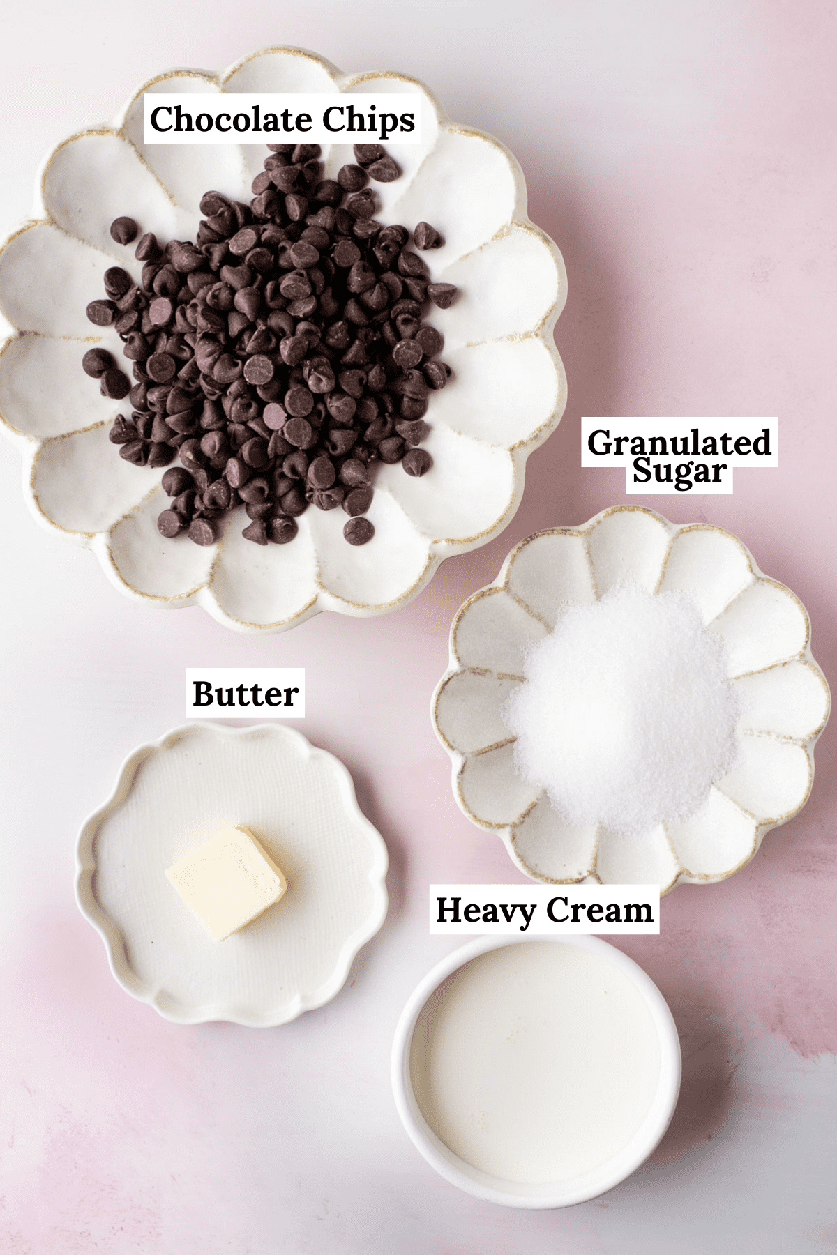 the ingredients for hot fudge sauce including heavy cream, granulated sugar, semi-sweet chocolate chips and butter