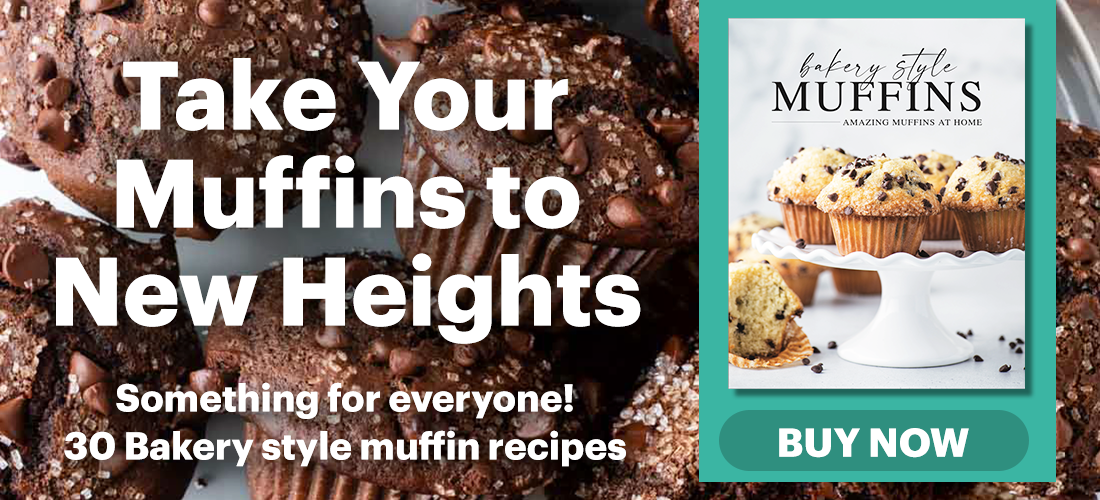 Close-up of chocolate and easy banana muffins with text promoting a muffin recipe book. A book cover featuring delicious muffins is on the right, next to a green BUY NOW button. Text reads, Take Your Muffins to New Heights. 30 Bakery style muffin recipes.