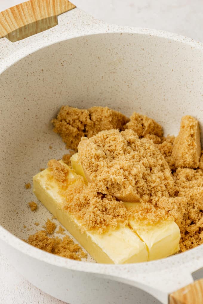 brown sugar and two sticks of butter in a white pot