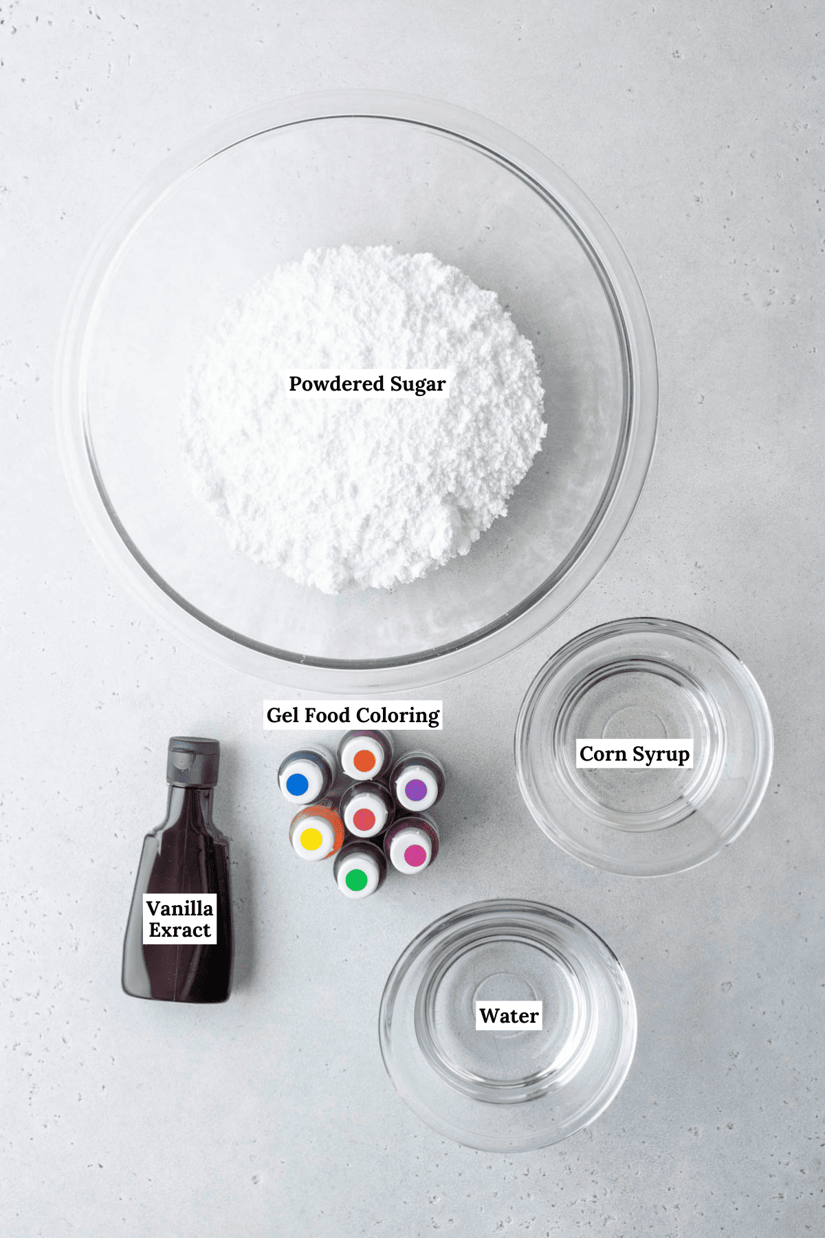 royal icing ingredients including gel food coloring, powdered sugar, corn syrup, water and vanilla extract