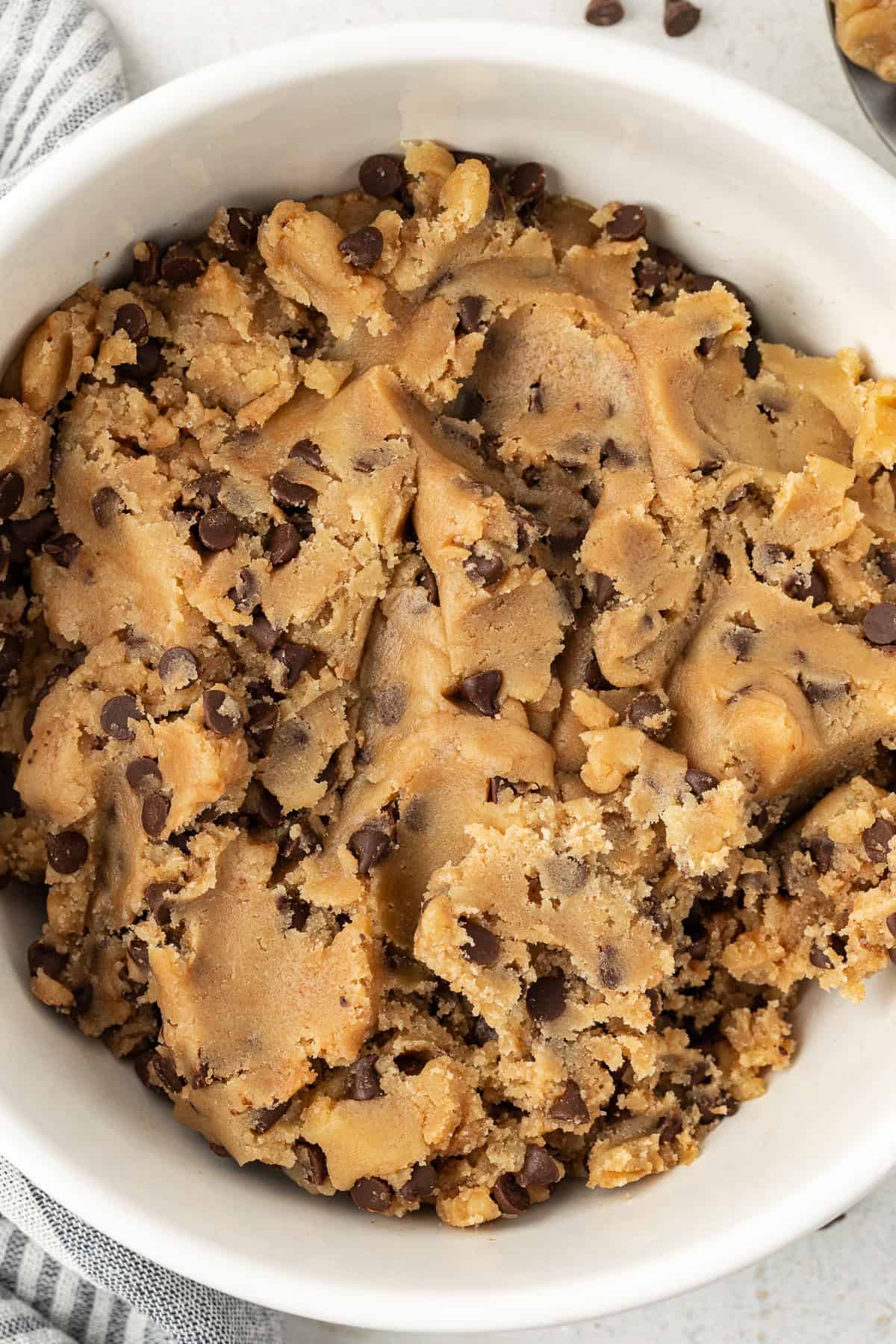 chocolate chip cookie dough in a large white bowl