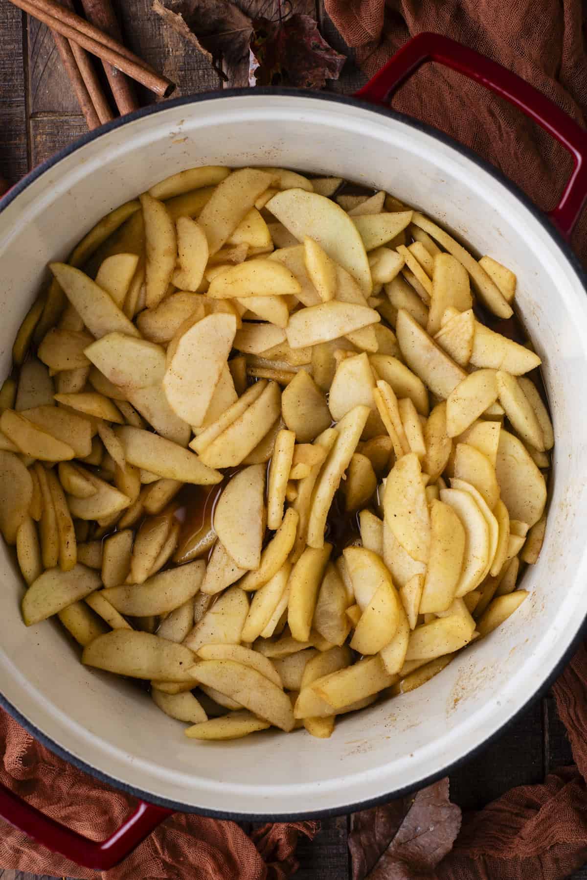 over head view of apple slices cooked in a large pot