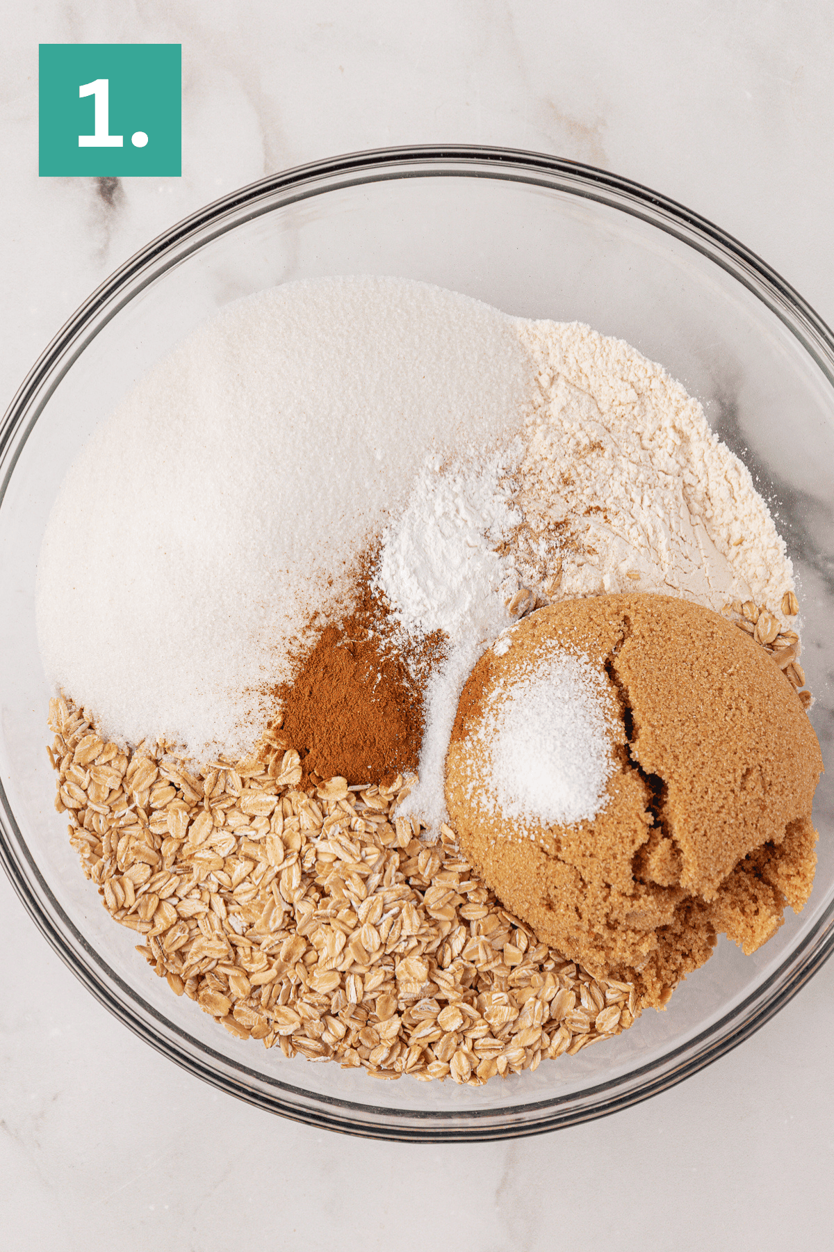 oats, flour, granulated sugar, brown sugar, baking powder, salt, and cinnamon in a large glass bowl