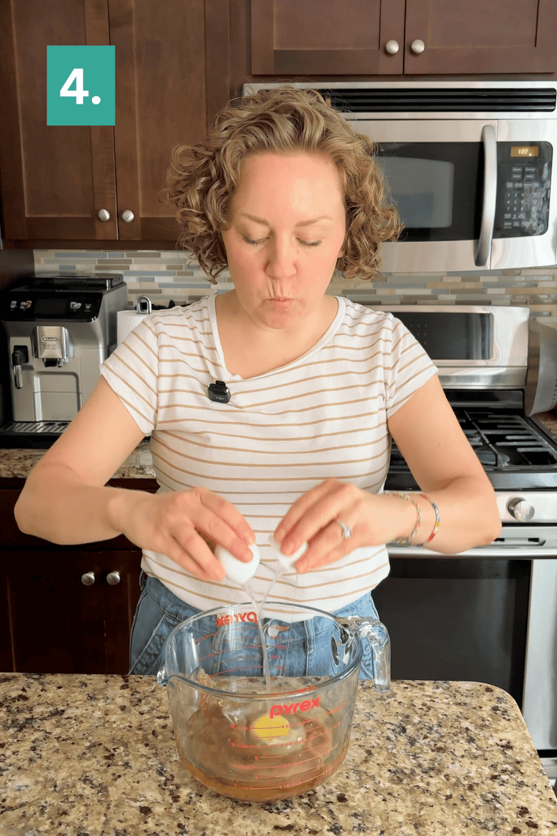 A woman in a striped shirt cracks an egg into a glass measuring cup in a kitchen. A green box with the number 4 is in the top left corner of the image.
